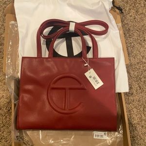 Never used! Still in the bag! NWT!! Telfar medium shopping  bag!! Oxblood Red!!